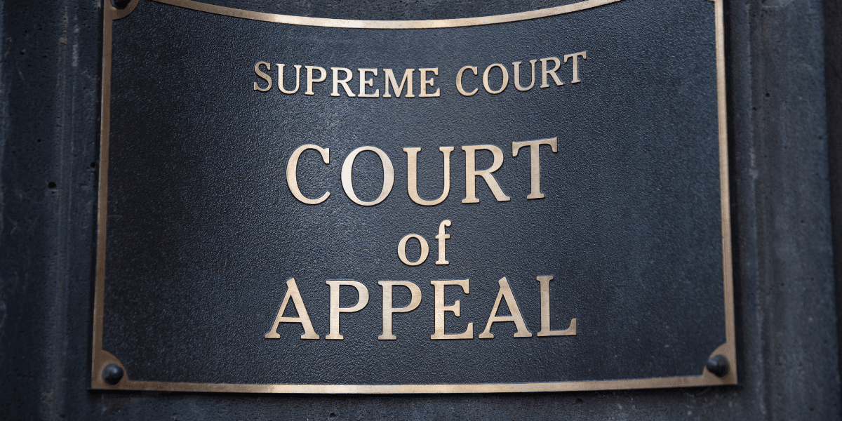 Plaque indicating the Supreme Court of Appeal on a stone wall