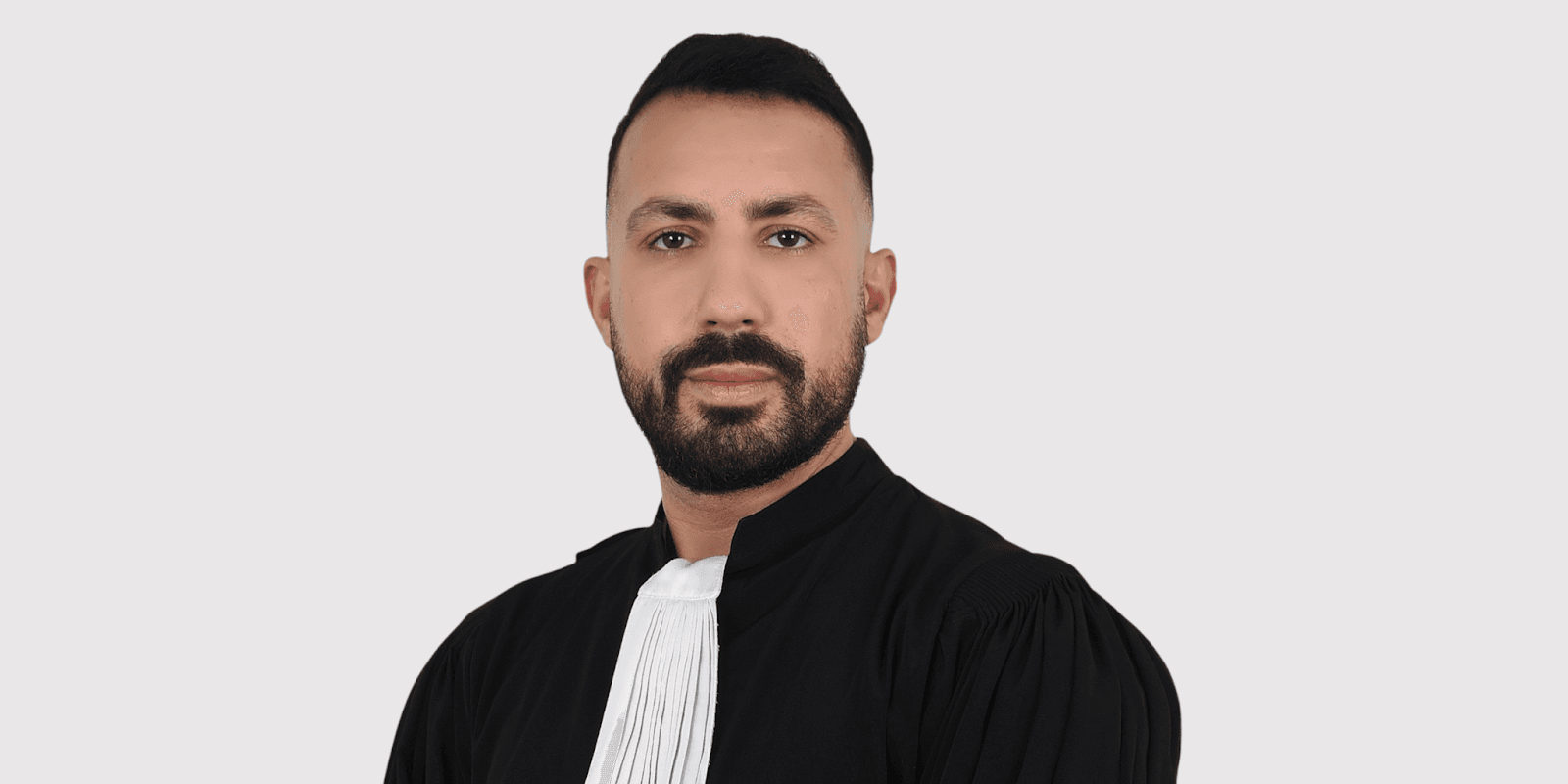 Adnane El Khaili, CEO of El Khaili Law Firm, wearing formal legal attire, representing the future of AI in law.