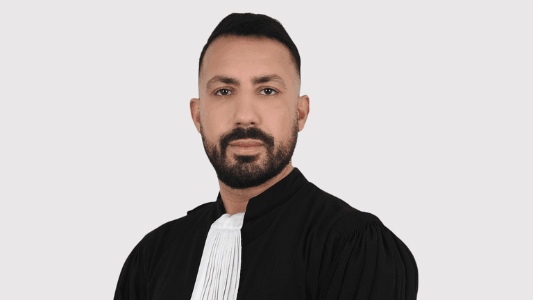 Adnane El Khaili, CEO of El Khaili Law Firm, wearing formal legal attire, representing the future of AI in law.
